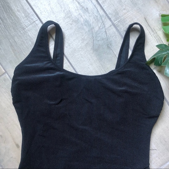 Gottex front skirted side swept ribbed one piece bathing suit black. Size 14. - Picture 4 of 11